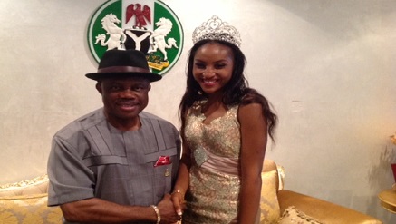 Chief Willie Obiano, governor, Anambra state  congratulating Miss Chizoba Ejike, Miss Independence Anambra 2014.